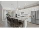Bright kitchen with a large island, stainless steel appliances, and modern finishes for cooking convenience at 2818 Starwood Ct, Lakewood Ranch, FL 34211