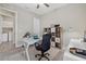 Comfortable office with sleek desk, display shelving, and bright natural light at 2818 Starwood Ct, Lakewood Ranch, FL 34211