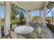 Inviting outdoor seating area with comfortable chairs and tables, perfect for enjoying community views at 2818 Starwood Ct, Lakewood Ranch, FL 34211