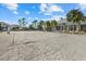 Well-maintained sand volleyball court with professional-grade net, ideal for friendly community matches at 2818 Starwood Ct, Lakewood Ranch, FL 34211