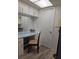 A convenient dressing area with a vanity, mirror, and overhead lighting for comfortable prep at 3368 Lake Bayshore Dr # 217 Building P, Bradenton, FL 34205