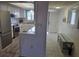 Bright, modern kitchen with stainless steel appliances, white cabinets, and a tiled backsplash at 3368 Lake Bayshore Dr # 217 Building P, Bradenton, FL 34205