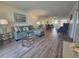 Spacious living room with an open layout and views of the dining area and kitchen at 3368 Lake Bayshore Dr # 217 Building P, Bradenton, FL 34205