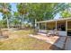 Backyard with an outdoor patio and a screened-in porch provides a relaxing retreat at 337 Somerset Ave, Sarasota, FL 34243