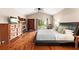 Bright main bedroom with wood floors, a ceiling fan and natural light at 337 Somerset Ave, Sarasota, FL 34243