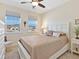 Inviting bedroom with natural light, side tables, and decorative pillows at 3623 Pitch Ln, Sarasota, FL 34232