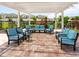 Comfortable outdoor seating area featuring plush cushions and pergola at 3623 Pitch Ln, Sarasota, FL 34232