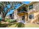 A backyard patio with lovely green space and manicured landscaping at 3810 N Oak Dr # N61, Tampa, FL 33611