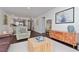 Spacious living room with a contemporary decor and open concept design to the dining area at 3810 N Oak Dr # N61, Tampa, FL 33611