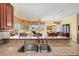 Kitchen sink with granite countertops and views of dining room and backyard at 4173 Westbourne Cir, Sarasota, FL 34238