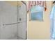 Shower features sleek glass doors and a tiled interior at 4173 Westbourne Cir, Sarasota, FL 34238
