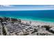 Expansive beach view with pristine sands, clear waters, and ample parking for a perfect day of seaside relaxation at 4307 Gulf Dr # 109, Holmes Beach, FL 34217