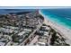 Scenic coastal property showcasing beach access, condo living, and a charming neighborhood with parking amenities at 4307 Gulf Dr # 109, Holmes Beach, FL 34217