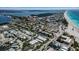 Scenic coastal community view with charming homes, a shared pool, nearby beach access, and a relaxed neighborhood ambiance at 4307 Gulf Dr # 109, Holmes Beach, FL 34217