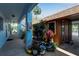 Tranquil courtyard with lush plants and shaded walkway at 4307 Gulf Dr # 109, Holmes Beach, FL 34217