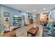 Comfortable living room with cozy seating and entertainment center at 4307 Gulf Dr # 109, Holmes Beach, FL 34217