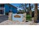 Entrance sign for Cayman Cay community at 4307 Gulf Dr # 109, Holmes Beach, FL 34217