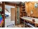 Functional storage with workbench, shelves and pegboard, and easy access to the outdoors at 4307 Gulf Dr # 109, Holmes Beach, FL 34217