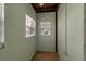 Bright sunroom with textured walls, windows, and ceiling fan at 4307 Gulf Dr # 109, Holmes Beach, FL 34217