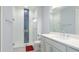 This bathroom features a glass-enclosed shower, modern vanity, and sleek fixtures, offering a luxurious feel at 4325 Renwick Dr, Parrish, FL 34219