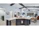 Modern kitchen showcasing a spacious island, stainless steel dishwasher, and open layout at 4325 Renwick Dr, Parrish, FL 34219