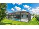 Screened-in pool with outdoor seating, offering a private oasis for relaxation and enjoyment at 4325 Renwick Dr, Parrish, FL 34219