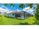 Spacious backyard with a screened-in pool, perfect for outdoor entertaining and relaxation at 4325 Renwick Dr, Parrish, FL 34219