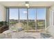 Lanai with floor to ceiling windows overlooking a green landscape at 4460 Fairways Blvd #604 Blvd # 604, Bradenton, FL 34209