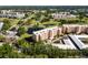 Aerial view of condo community with golf course, ponds, and mature trees at 4570 Pinebrook Cir # 406, Bradenton, FL 34209