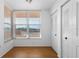 Bright bedroom featuring a large window and closet at 4570 Pinebrook Cir # 406, Bradenton, FL 34209