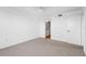 Comfortable bedroom featuring a door to a small bathroom or closet at 4570 Pinebrook Cir # 406, Bradenton, FL 34209