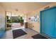Building lobby featuring tiled floors, an elevator, and an open entrance to exterior at 4570 Pinebrook Cir # 406, Bradenton, FL 34209