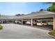 Covered parking area, offering shelter for multiple vehicles at 4570 Pinebrook Cir # 406, Bradenton, FL 34209