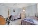 Inviting bedroom with two twin beds, neutral tones, and a comfortable desk area at 520 Ideal Pl, North Port, FL 34287