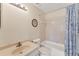 Neat bathroom featuring tile floors, a single vanity, and a shower/tub combination at 5264 Lake Village Dr # 48, Sarasota, FL 34235