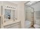 Well-lit bathroom featuring a vanity with ample counter space and a shower/tub combination at 5264 Lake Village Dr # 48, Sarasota, FL 34235