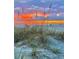 Beautiful beach scene with dunes, beach grass, ocean, people, and a vibrant sunset at 5264 Lake Village Dr # 48, Sarasota, FL 34235