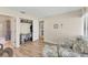 Spacious bedroom with a closet, ensuite bathroom and a coastal style chair and ottoman at 5264 Lake Village Dr # 48, Sarasota, FL 34235