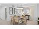 Elegant dining room with stylish seating, modern lighting, and sophisticated decor creating a welcoming space at 5616 Summit Pointe Cir # 101, Bradenton, FL 34210