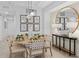 Bright dining room with stylish seating, modern lighting, and sophisticated decor creating a welcoming space at 5616 Summit Pointe Cir # 101, Bradenton, FL 34210