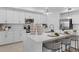 Stylish modern kitchen featuring an island with seating, stainless steel appliances, and ample counter space at 5616 Summit Pointe Cir # 101, Bradenton, FL 34210