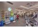 Well-equipped fitness center with modern exercise machines and a bright, airy atmosphere at 5811 Campina Pl, Palmetto, FL 34221
