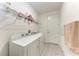 Bright laundry room with a modern washer and dryer at 5811 Campina Pl, Palmetto, FL 34221