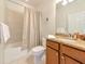 Bathroom featuring granite counters and warm cabinets at 5952 Snowy Egret Dr, Sarasota, FL 34238