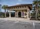 Community building featuring covered parking and a welcoming entrance at 5952 Snowy Egret Dr, Sarasota, FL 34238
