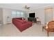 Comfortable living area with a large sectional sofa and plenty of natural light at 5952 Snowy Egret Dr, Sarasota, FL 34238