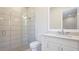 Modern bathroom featuring a glass enclosed shower and vanity at 600 Blue Shell Loop, Sarasota, FL 34240