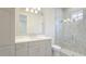 Stylish bathroom featuring a sleek vanity and glass-enclosed shower at 600 Blue Shell Loop, Sarasota, FL 34240
