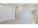 Bright bedroom with hardwood floors, closet and an ensuite bathroom at 600 Blue Shell Loop, Sarasota, FL 34240