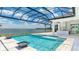 Backyard with pool, spa and lake views at 600 Blue Shell Loop, Sarasota, FL 34240